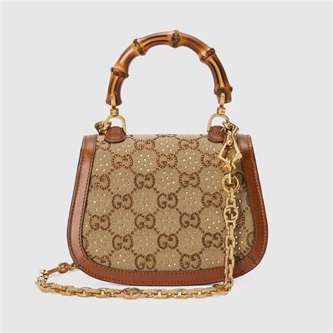 gucci bamboo 1947 small top handle bag|Gucci monogram bamboo handle bag.